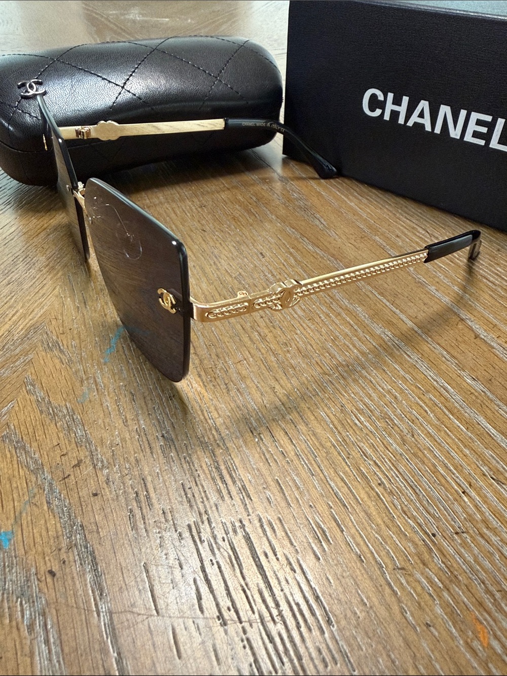 CHANEL Black Rimless Square Sunglasses with Gold Accents - Picture 5 of 9